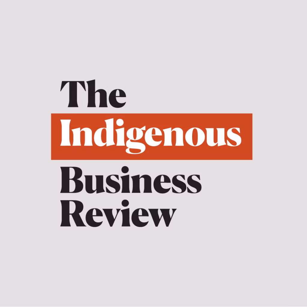 Text logo reading The Indigenous Business Review on a light grey background. The word Indigenous, inspired by National Indigenous Times, is highlighted with a red rectangle behind it, whilst the other words are in black.