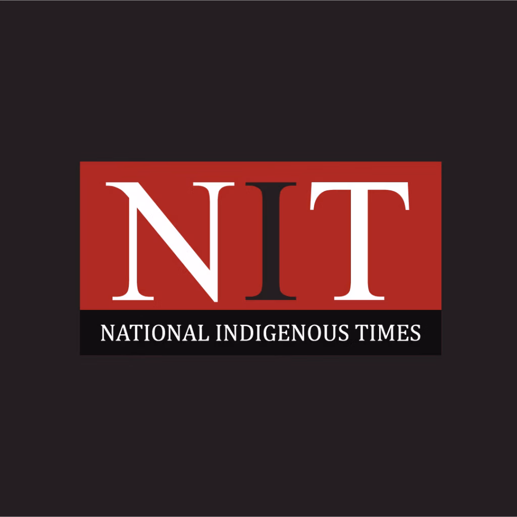 Logo for National Indigenous Times, a leader in Australian Indigenous media. Large white letters NIT on a red background; beneath, National Indigenous Times in white text on black, all set against a dark grey background.