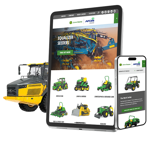 A tablet and smartphone display a John Deere website featuring farm equipment. Next to them is a yellow Volvo construction vehicle. The tablet shows images of various tractors and landscaping machines.