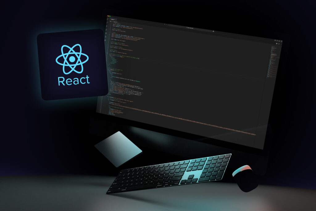 A dark-themed desk setup features a monitor displaying code, keyboard, mouse, and trackpad. The React logo on the left emphasises the programming environment’s focus on React Headless Development.