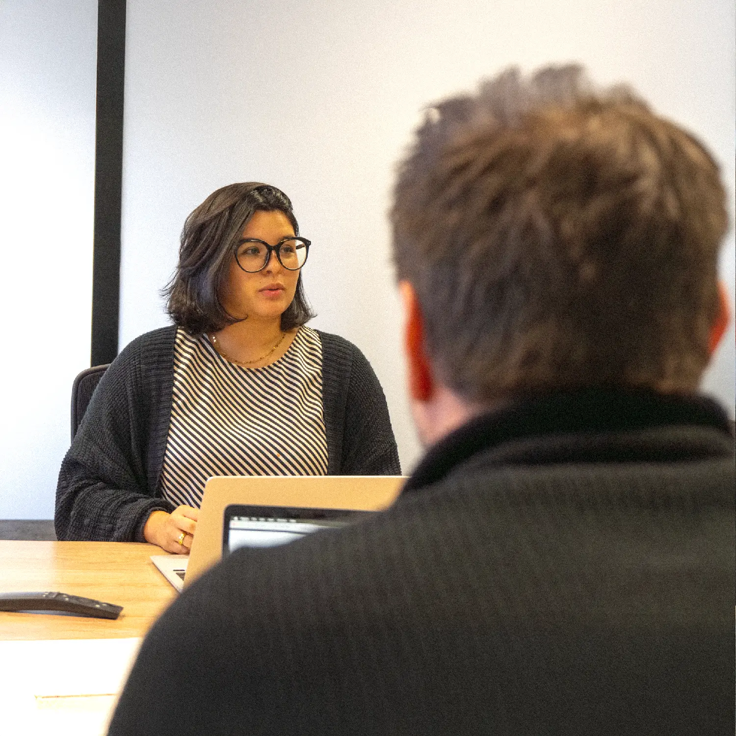 digital marketing expert discussing a campaign at a digital marketing agency