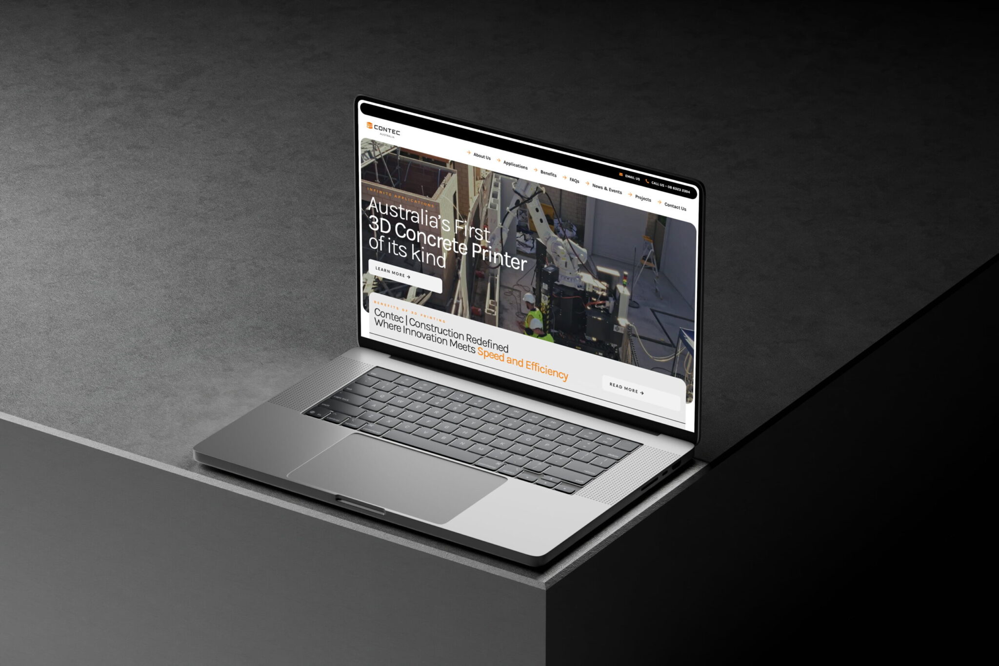 A laptop on a grey surface displays a website for Contec Australia, showcasing the country’s first 3D concrete printer with images of construction and text highlighting innovation, power, and efficiency.