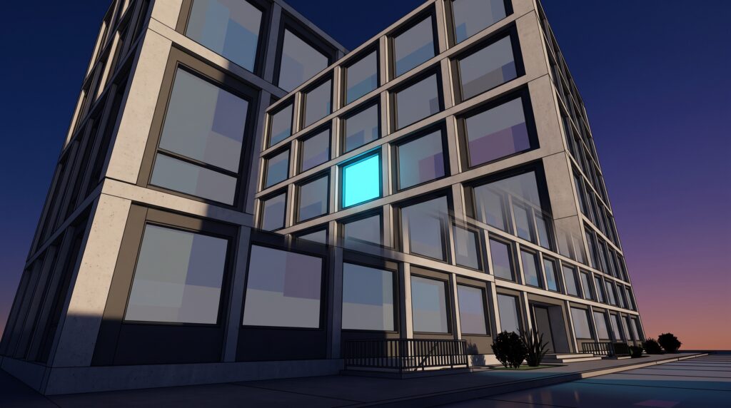 Low-angle view of a minimal city building at dusk whose windows are muted screens, with one window lit bright cyan